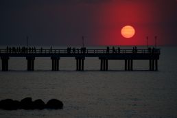 Saulėlydis nuo Palangos tilto